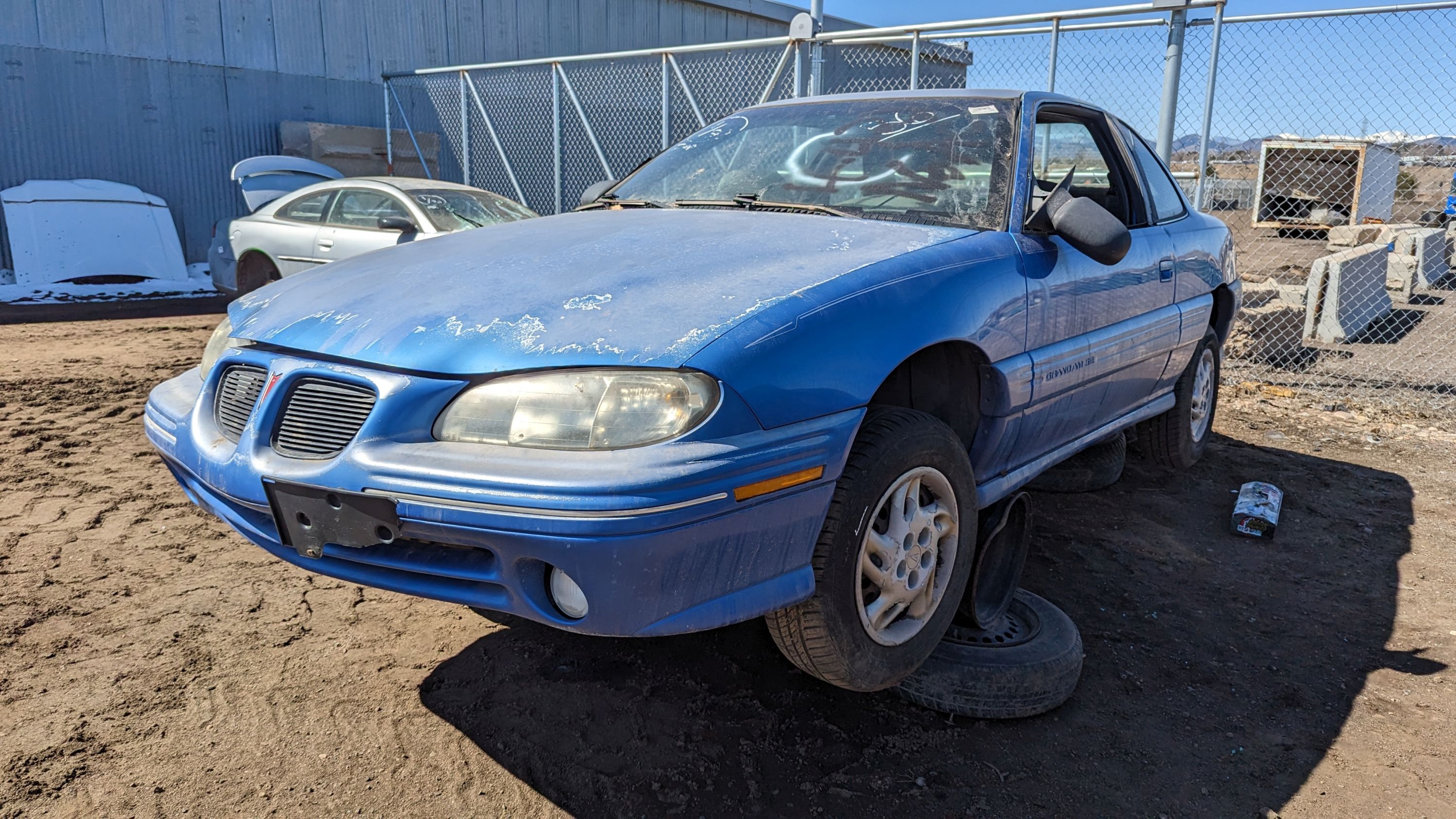 22 - 1996 Pontiac Grand Am SE in Colorado junkyard - photo by Murilee Martin